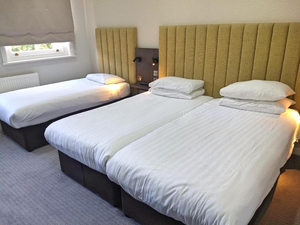 A triple room at the Garden Court Hotel.