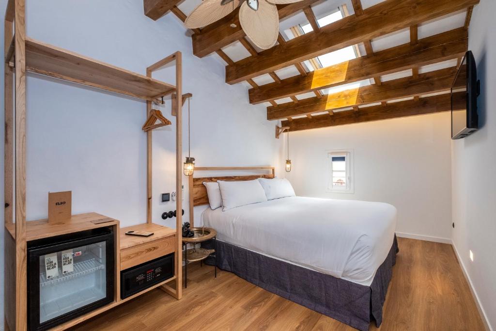Cama o camas de una habitación en Nao Catedral Boutique Hotel