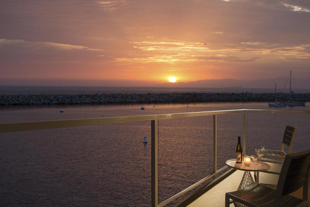 A sunset view from a balcony at The Portofino Hotel.