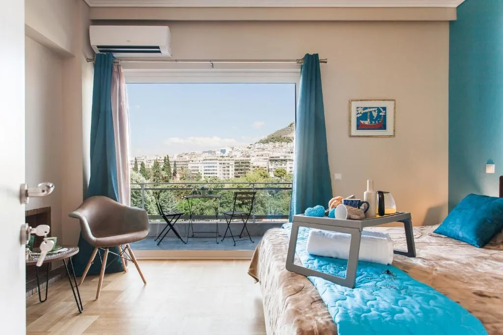 Central high-class and safe rooms next to Metro Airport Line with Acropolis View from balcony, Athens, Greece