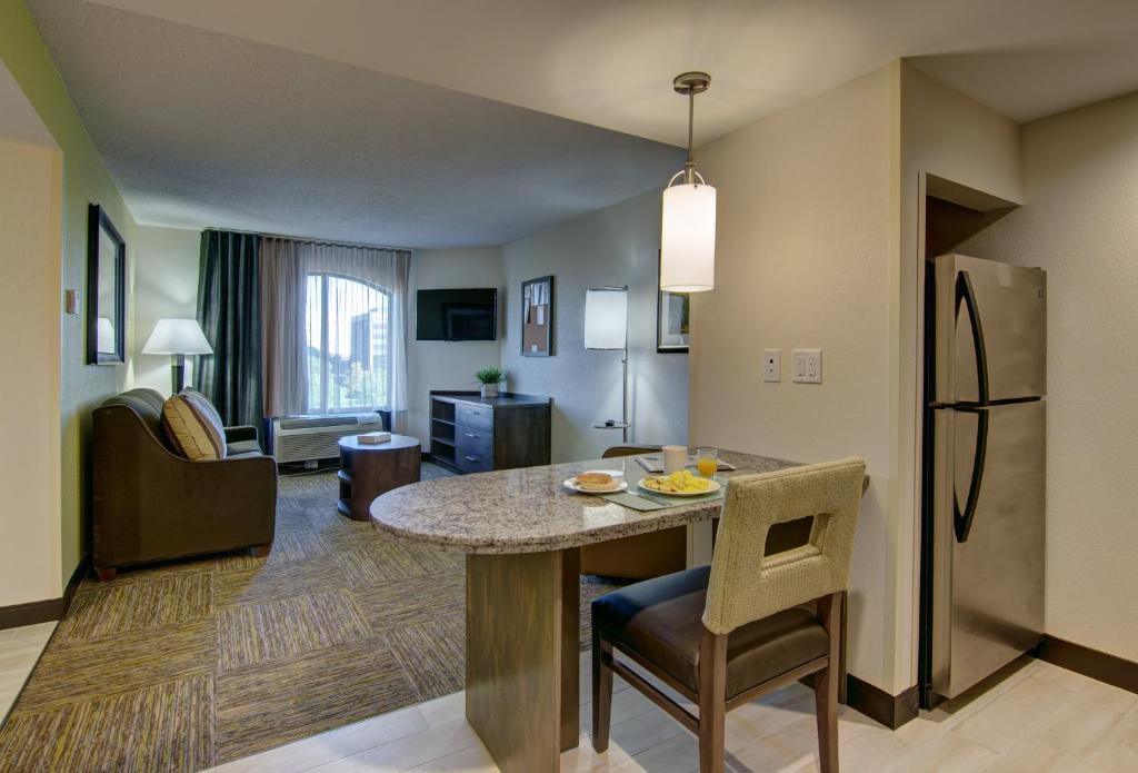 A room with a kitchen at the Candlewood Suites Richmond - West Broad.