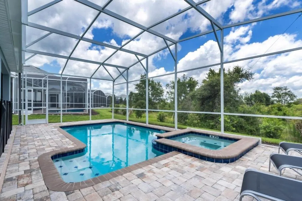 Gameroom , Theater Room and Private Pool Spa Oh My villa, Davenport, United States