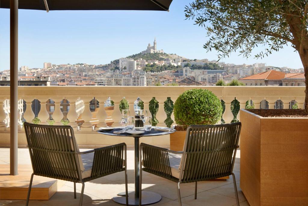Terrace overlooking the port of Marseille as well as the Notre Dame cathedral