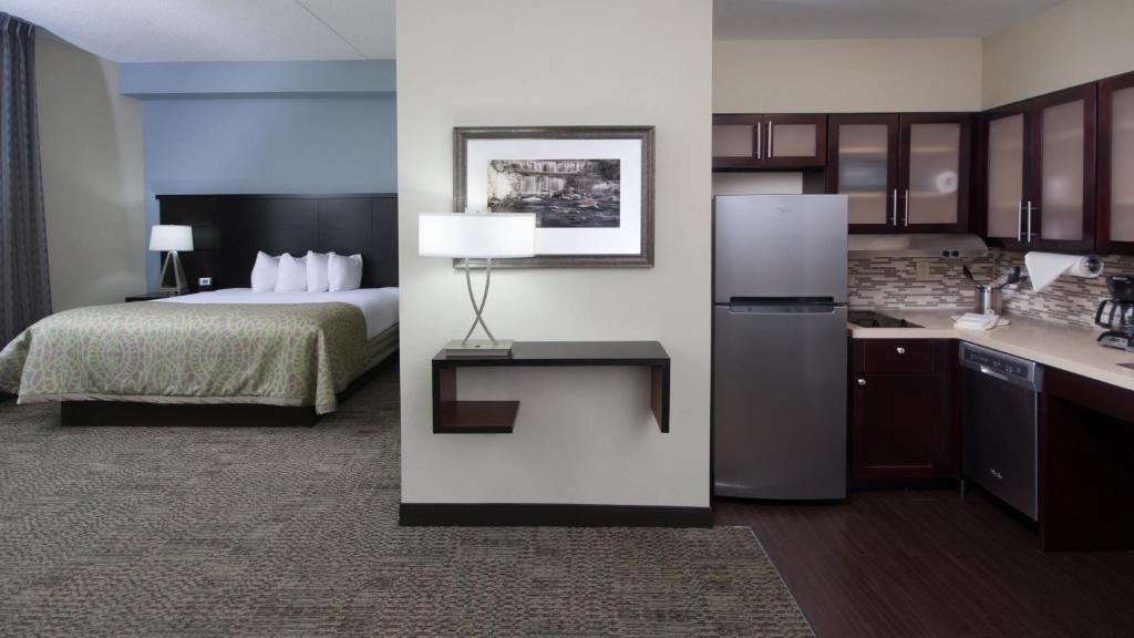 A room and its kitchen at the Staybridge Suites Buffalo - Amherst. 