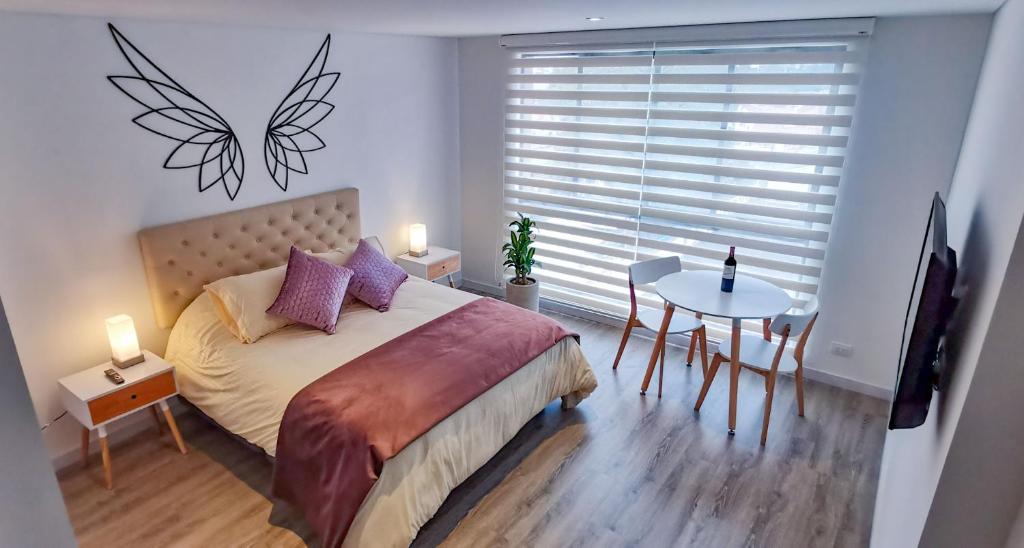 Cama o camas de una habitación en Apartamento de gran estilo en Bogotá