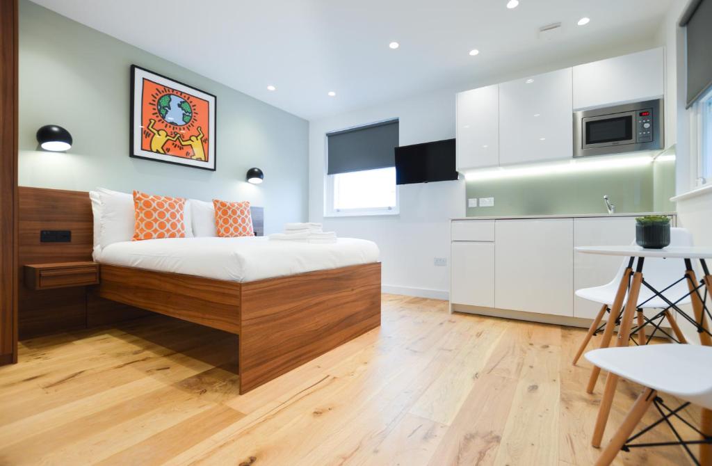 A room with a kitchenette at the Shepherd's Bush Green Serviced Apartments.
