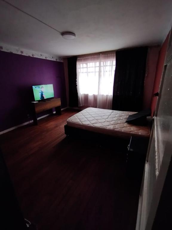 Cama o camas de una habitación en Casa Rosada