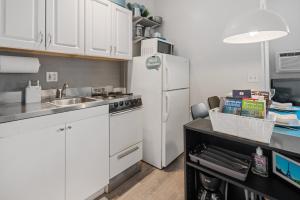 Great Location 2 Bedroom with Backyard Short Walk to Times Sq