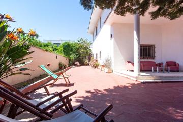 Casa con 3 camere letto e giardino spiaggia m123