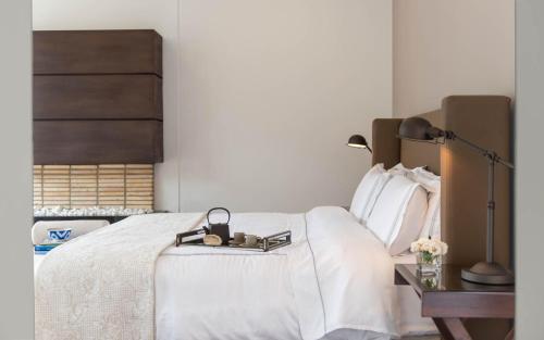 Cama o camas de una habitación en Attik Luxury Apts
