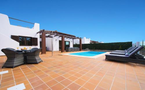5 star luxury villa, private heated pool, golf & sea views.