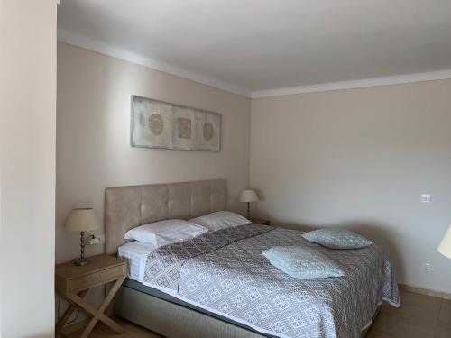 Cama o camas de una habitación en Apartamentai