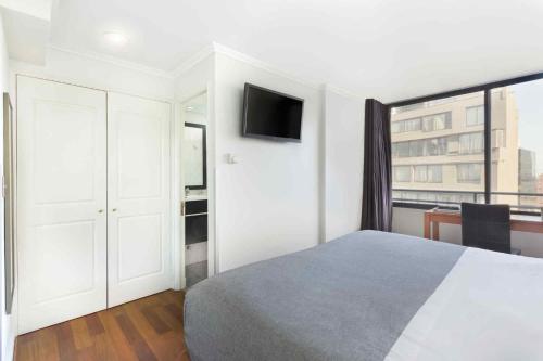 Cama o camas de una habitación en Santa Magdalena Apartments