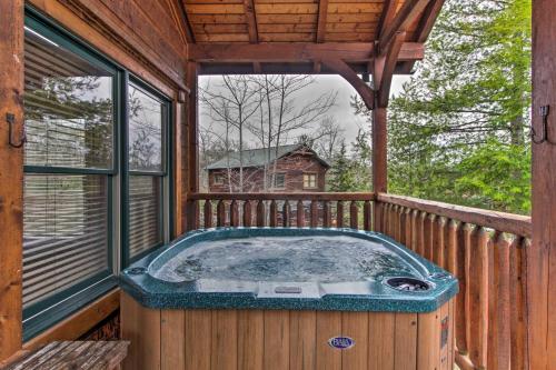 Sevierville Cabin with Home Theater, Hot Tub and Deck!