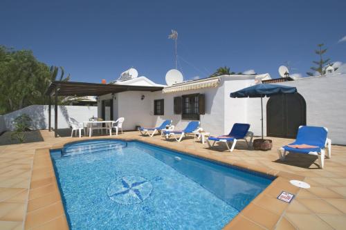 2 bedroom villa 'The Bungalow' with private heated pool.