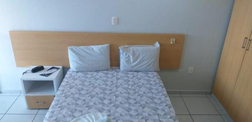 Cama o camas de una habitación en Flat em Ponta Negra, excelente localização