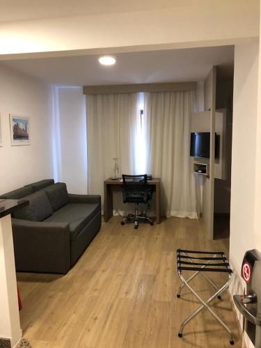 Zona de estar en un apartamento en la mejor ubicación en Itaim Bibi
