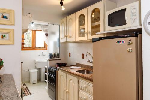 Una cocina o zona de cocina en Apartamento Solar das Rosas