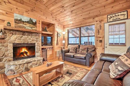 Riverfront Cabin with Hot Tub and Mountain Views!