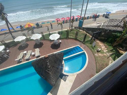 Vista de la piscina de Flat Beira Mar- Ap 306 #ELEGANCE o alrededores
