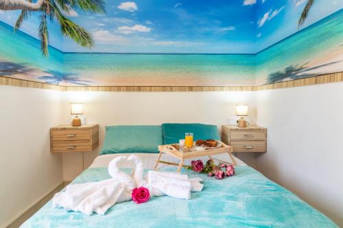 Cama o camas de una habitación en Increible Terraza con vistas al mar en San Agustín (3 hab)
