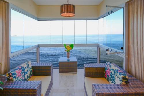 Apartamento Praia Apartamento no Morro do Maluf, frente ao mar Menor preço em Apartamento Praia Apartamento no Morro do Maluf, frente ao mar