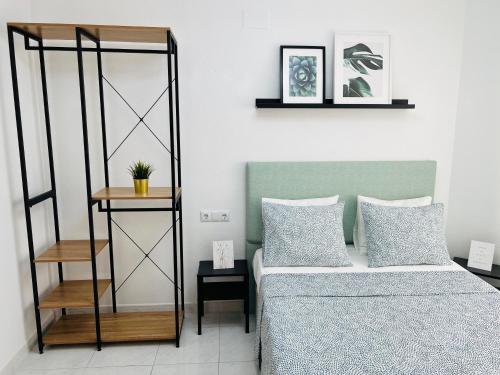 Cama o camas de una habitación en Apartament Sant Roc