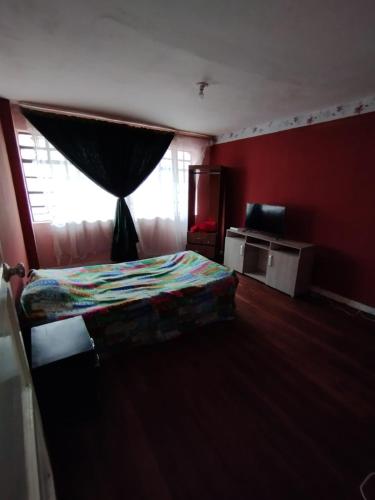 Cama o camas de una habitación en Casa Rosada