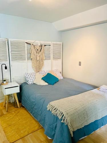 Cama o camas de una habitación en Solo para ti Studio en el mejor barrio de Santiago
