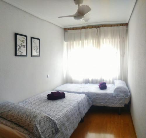 Cama o camas de una habitación en Apartamento grande, 2 dormitorios + garaje