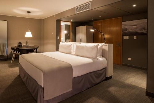 Cama o camas de una habitación en Solace Hotel Santiago