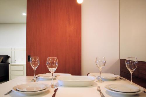 Un restaurante o sitio para comer en Apartamento Moderno Centro Gramado