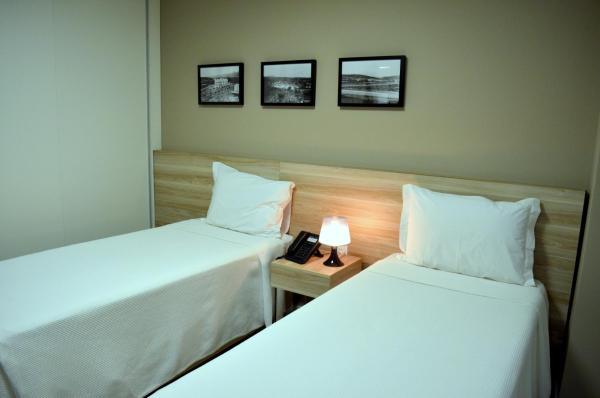 Cama o camas de una habitación en Ville Celestine Condo Hotel e Eventos