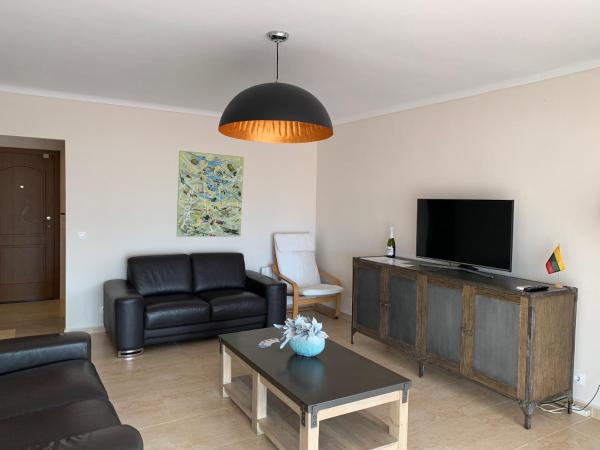 Zona de estar de Apartamentos