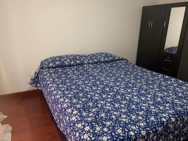 Cama o camas de una habitación en Apartamento en el Norte de Bogota
