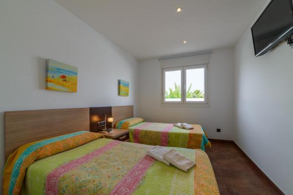 Cama o camas de una habitación en Villa Santandria Grupo Seranova Luxury Hotel