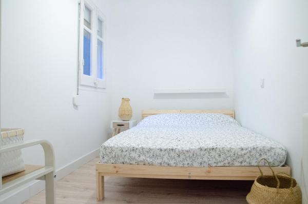 Cama o camas de una habitación en Apartamento NUEVO con encanto en SAGRADA FAMILIA