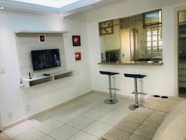 Una televisión o centro de entretenimiento en Apartamento Inteiro Morumbi 141