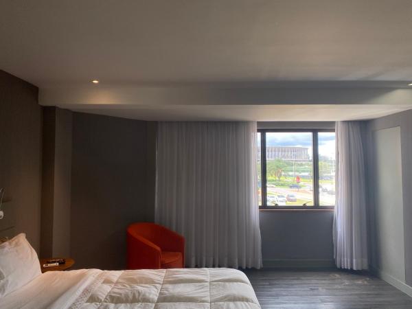 Cama o camas de una habitación en Grand Mercure Brasília - Ap Particular 112