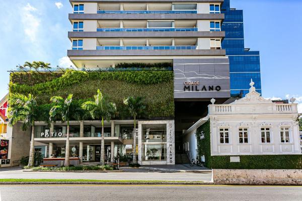 a large building with a building with a building at Apartamento moderno em condomínio com infraestrutura de clube CA14I in Florianópolis