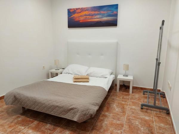 Cama o camas de una habitación en Apartments Abate 4