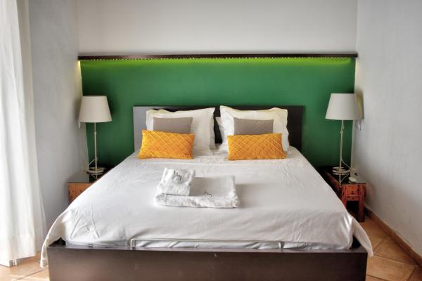 Cama o camas de una habitación en Apartamentos Las Naranjas