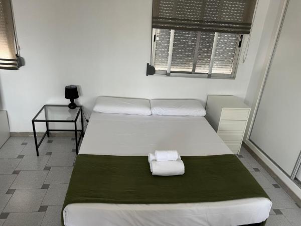 Cama o camas de una habitación en Attic Loft Gran Via