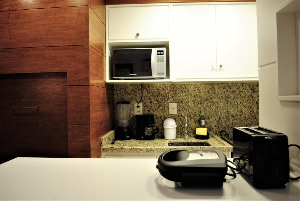 Una cocina o zona de cocina en Apartamento Moderno Centro Gramado
